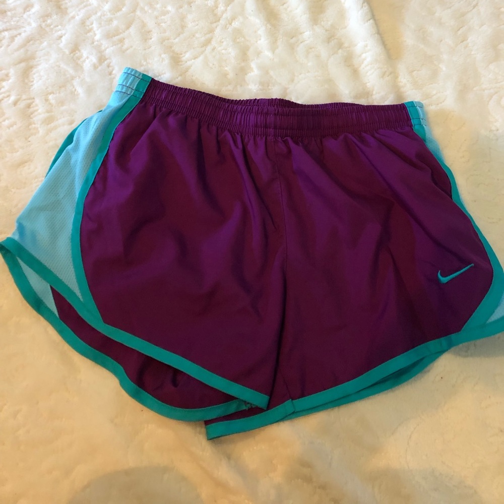 Set of 4 youth Nike shorts size small and medium